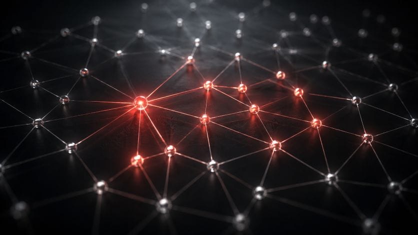 Abstract dark network grid with a glowing red central node, representing ad attribution and touchpoint connections