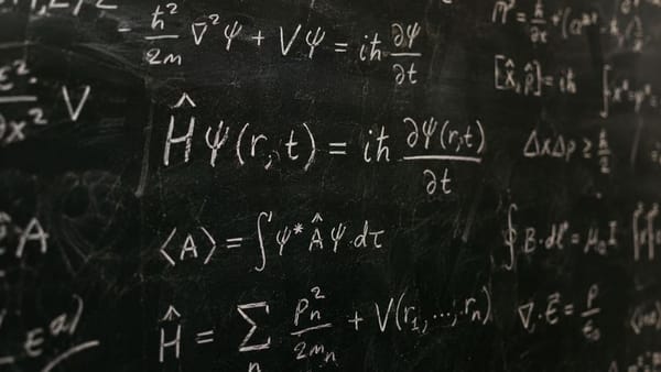 Chalkboard with math formulas representing data analytics